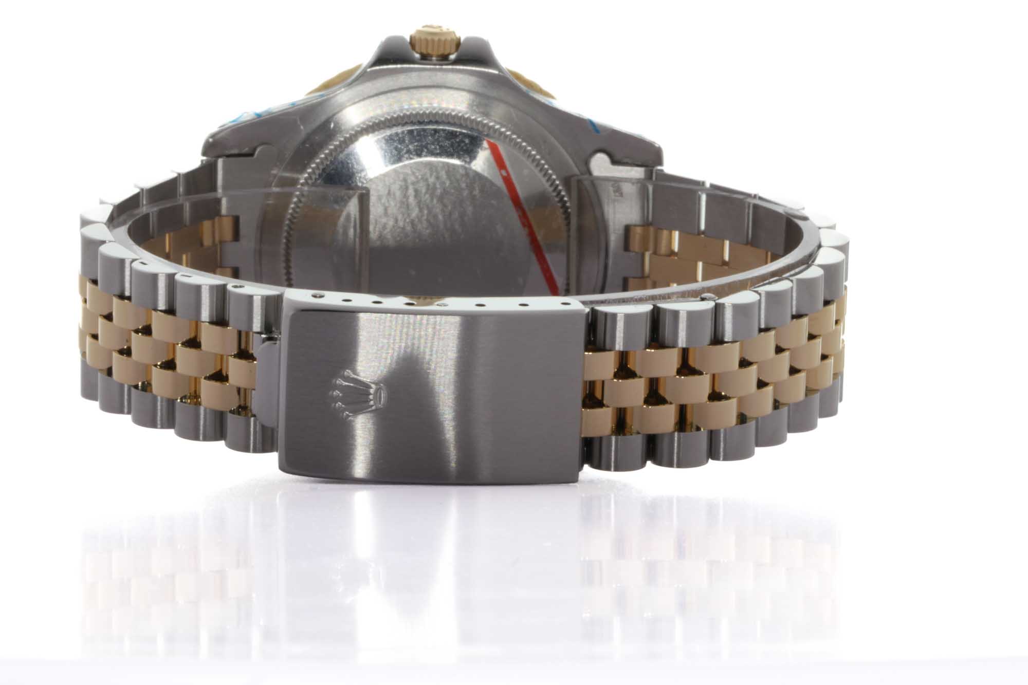 Rolex GMT-Master Jubilee Rolesor - Ref.1675 - Ser. 273x - Anno 1971 - Rolex Int. Service Guarantee & Box