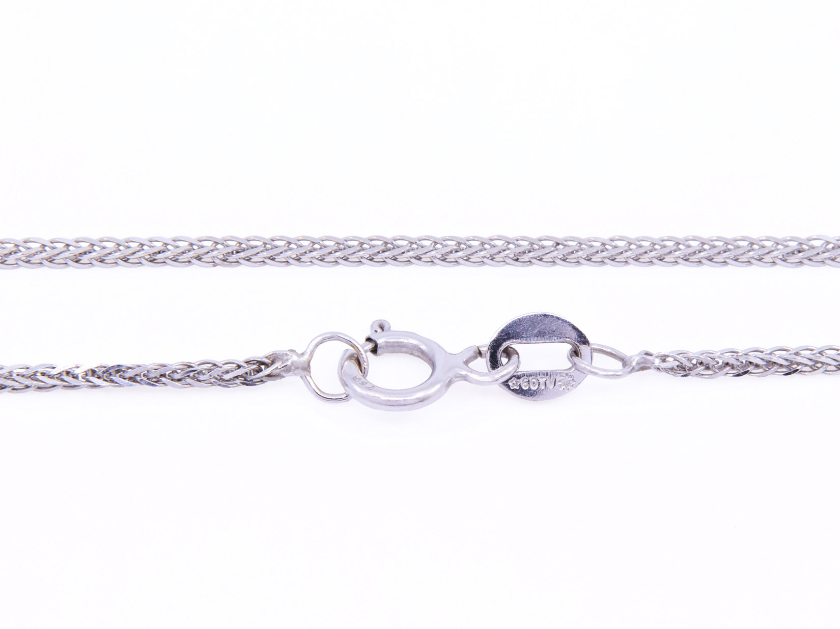 Collana in oro bianco 18Kt con ciondolo in oro bianco 18kt gr3,00, brillanti 0,60ct F-VVS e rubini 0,85ct