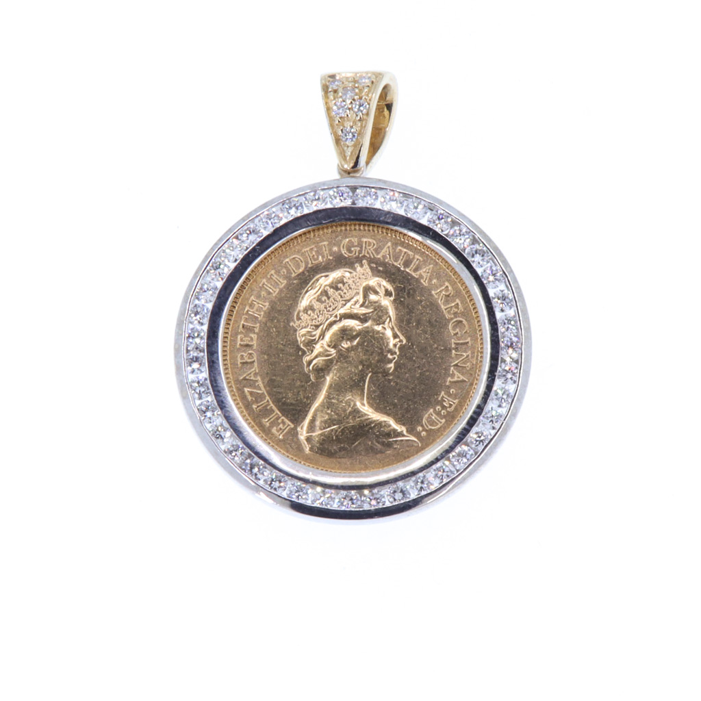 Pendente sterlina 1976 - Brillanti 1.08ct. oro 18kt. sterlina oro 22kt.