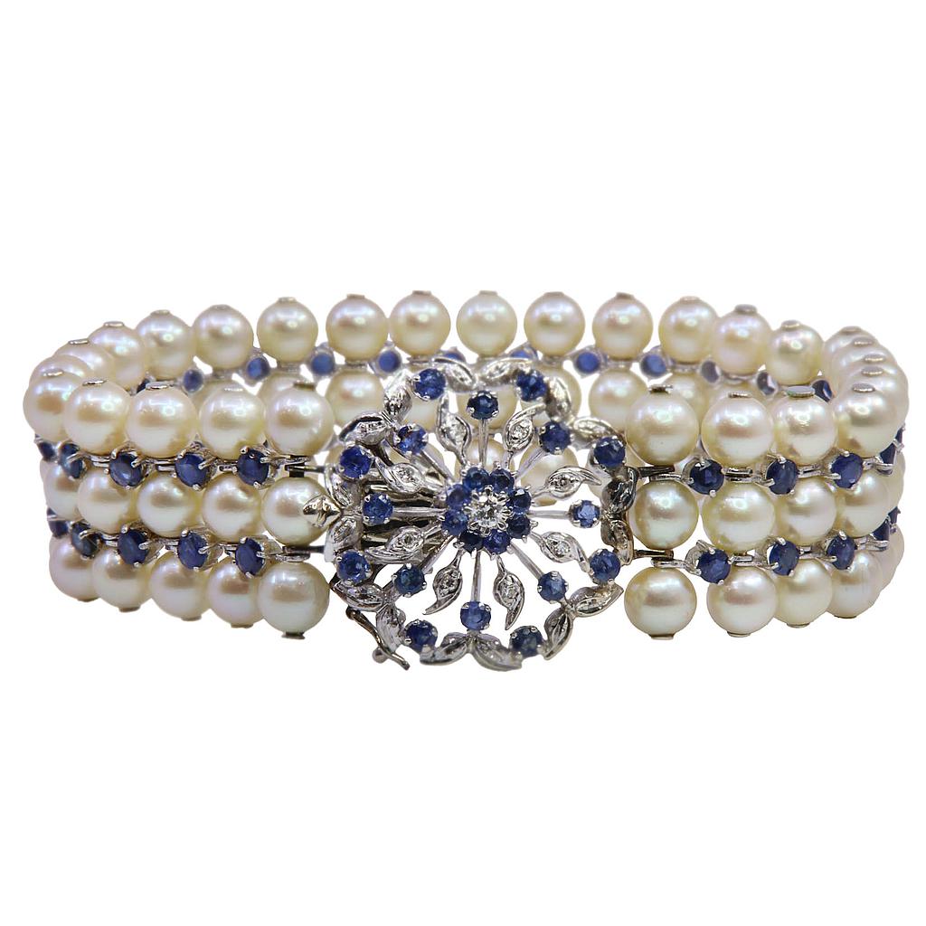 Bracciale con perle -  Susta in oro 18kt con brillanti e zaffiri blu, peso totale 50,9gr.