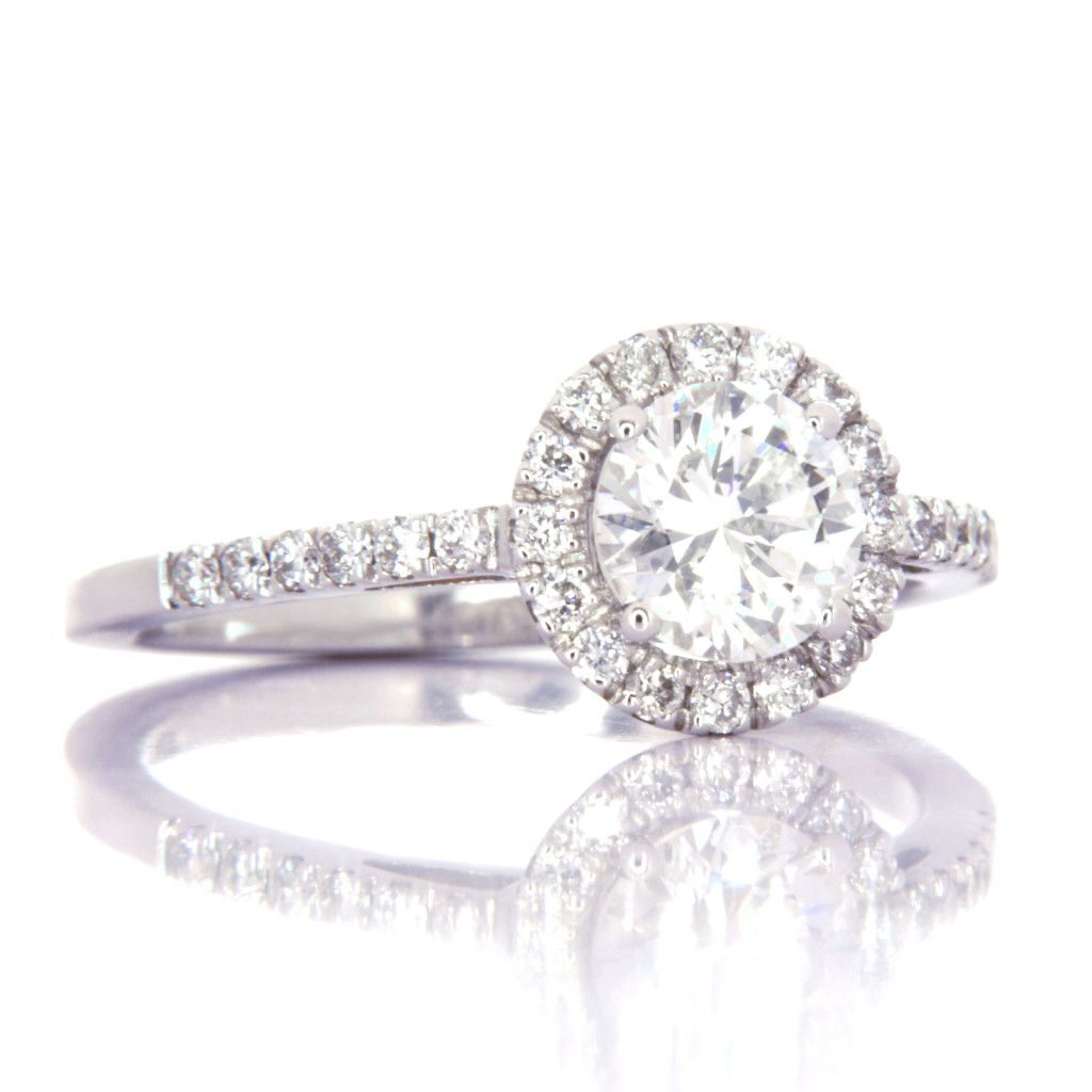 Solitario in oro bianco 18Kt gr ≃ 3,20 e giro brillanti F/G VVS