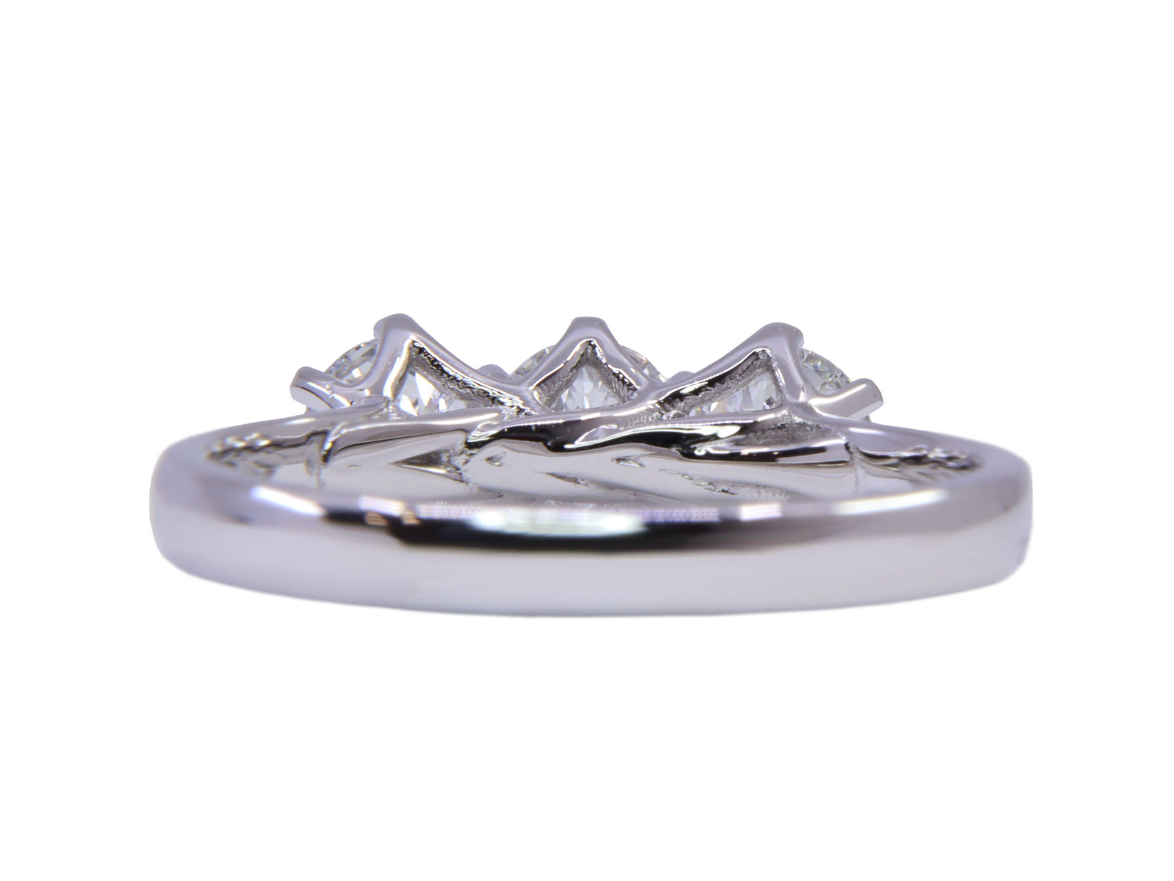 Anello Trilogy oro bianco 18Kt gr2.80 - caratura complessiva 0.91ct DSI1