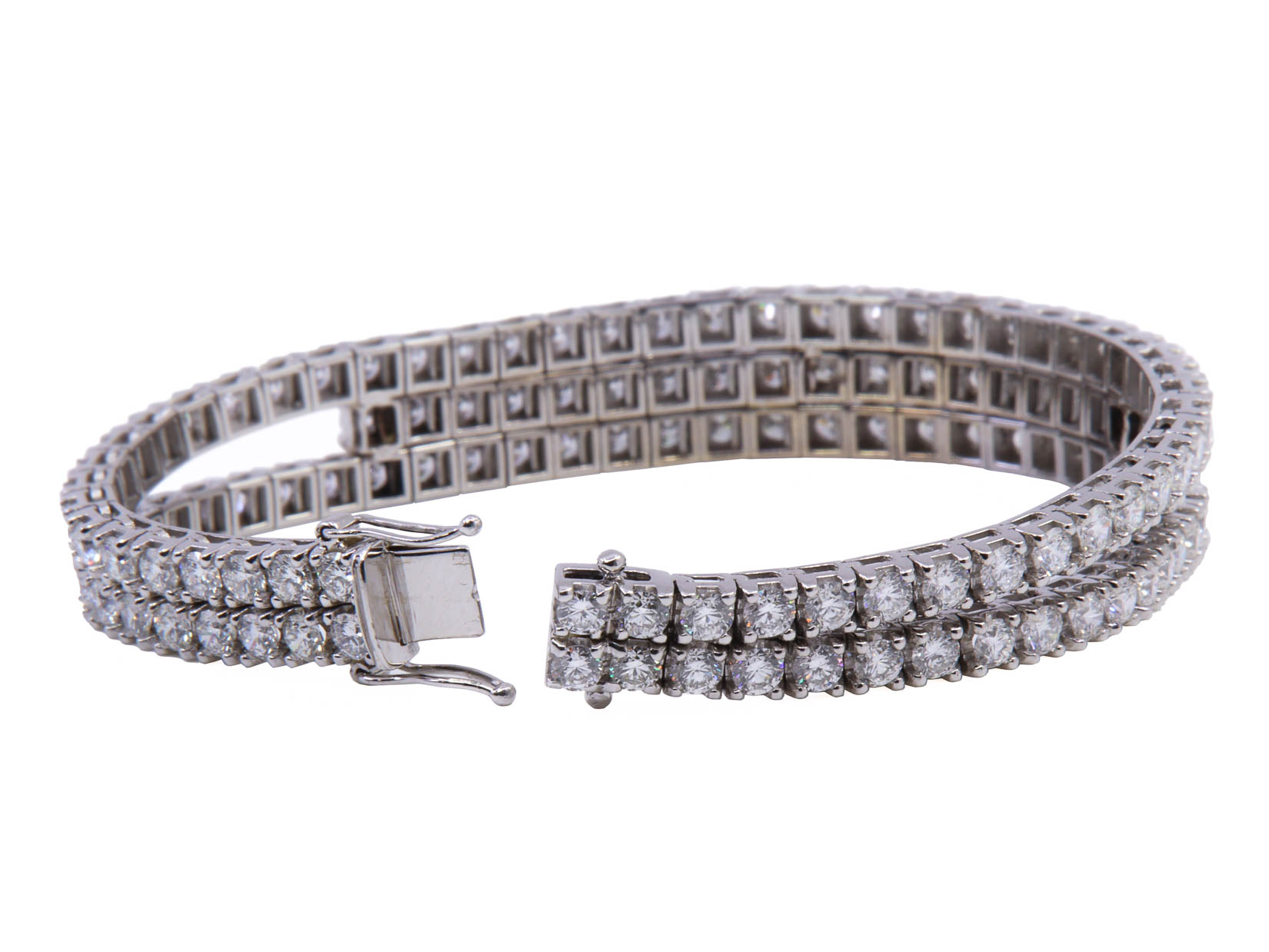 Bracciale tennis in oro bianco 18 kt. e brillanti ct. 12.83 Colore F/G Grado di Purezza VVS - gr.32.70 Cm.18