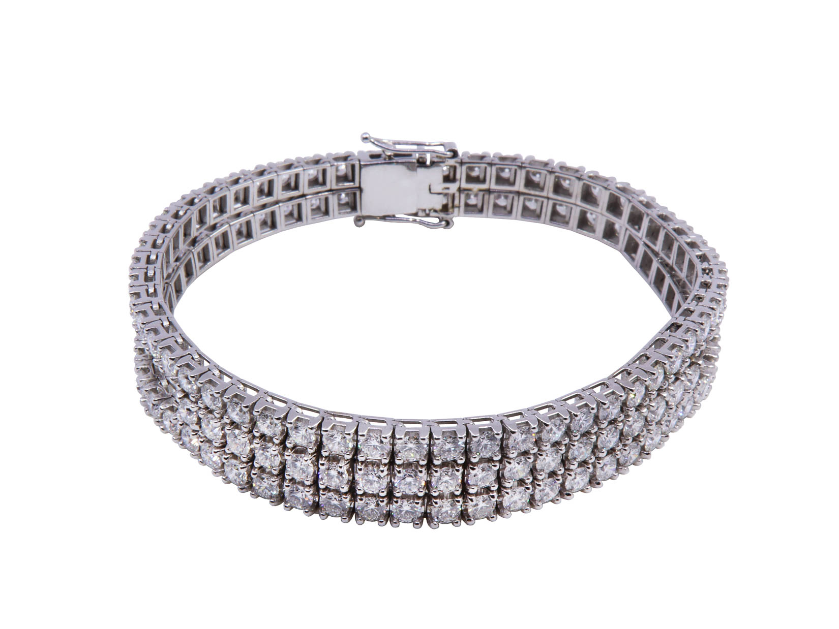 Bracciale tennis in oro bianco 18 kt. e brillanti ct. 12.83 Colore F/G Grado di Purezza VVS - gr.32.70 Cm.18